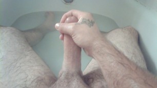 Jerking in the Bath with Cumshot