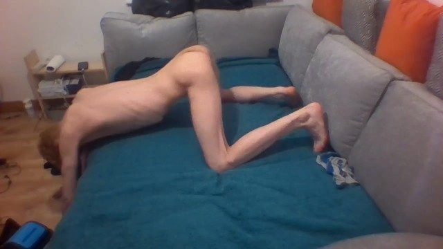 Skinny Blonde Teen Stretches his Body out on Sofa and Shows off Ribs