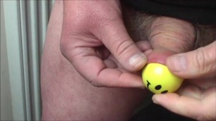 Foreskin with yellow smiley ball