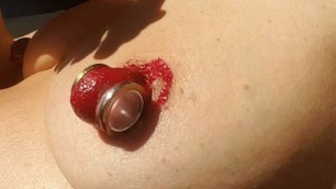 nippleringlover – horny milf nude outdoors peeling huge red painted pierced nipples close-up