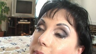 Elegant mature mom gets a cum load on her face after a hard ride with a younger guy