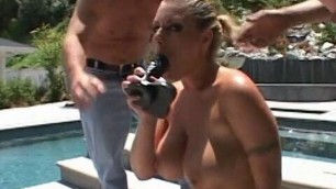 Watch her get out of the pool and suck on a dildo